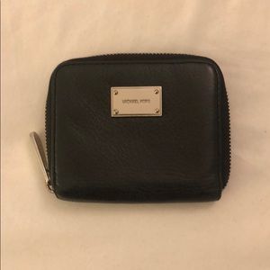 Black leather Michael Kors zip wallet